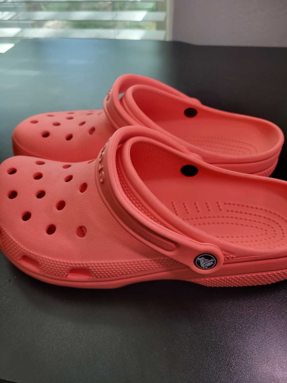 Crocs  Coral Slip Ons Mens Size 10 Womens Size 12